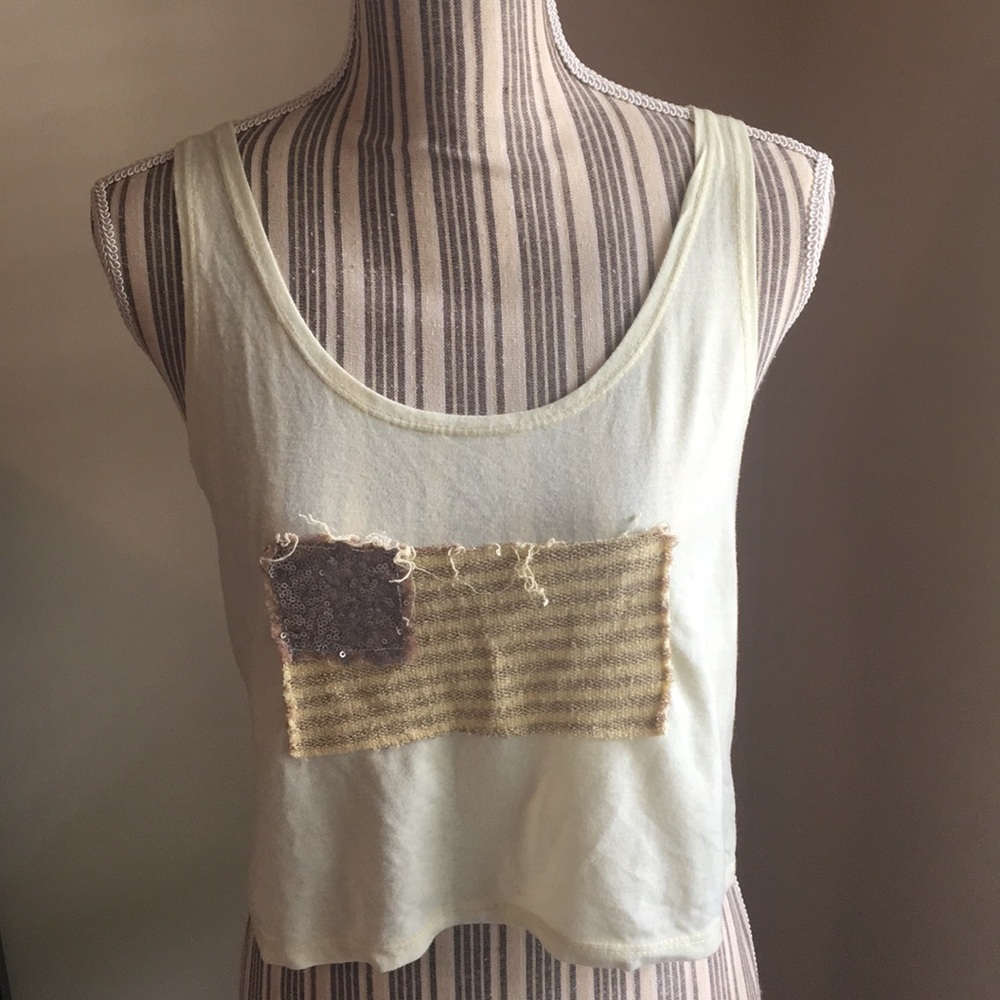 Yellow faded American flag mid-drift tank